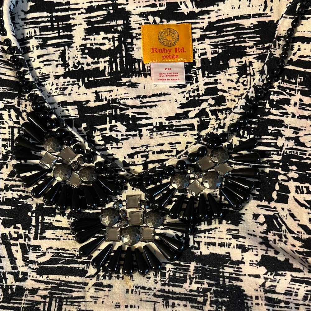 Chic Black and White Patterned Top with Beaded Embellishment